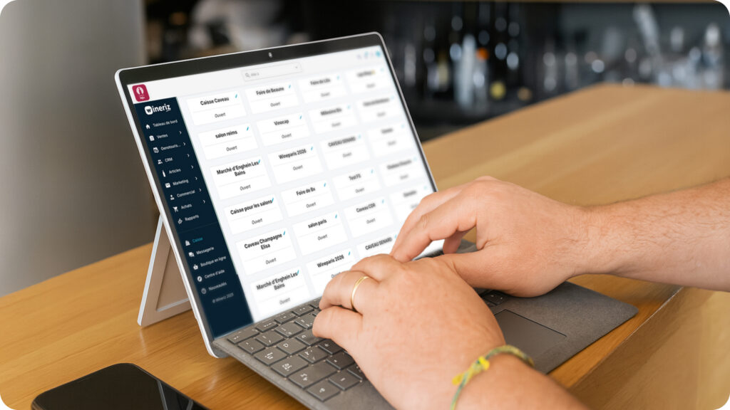 "Application de caisse Wineriz sur tablette lors d'un salon des vins"